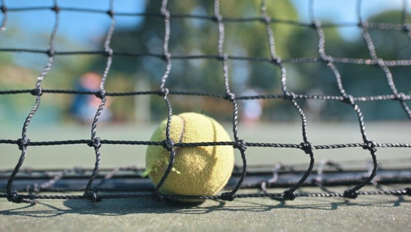 tennis ball hit the net in doubles